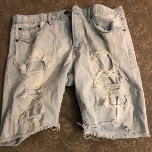 Light blue bleach jean shorts with rips